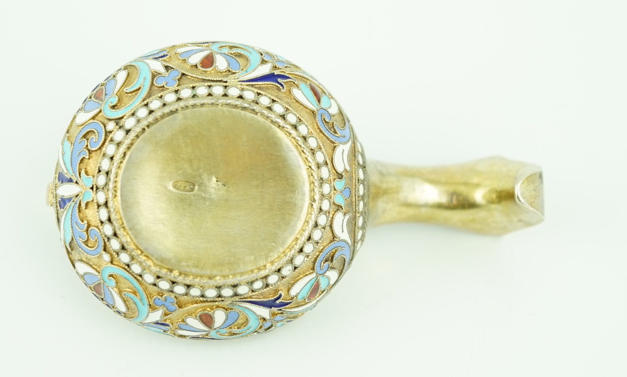 A late 19th/early 20th century Russian 84 zolotnik silver gilt and polychrome enamelled kovsh